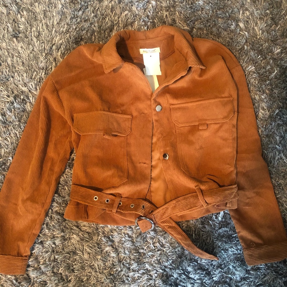 Orange/rust colored buckle jacket